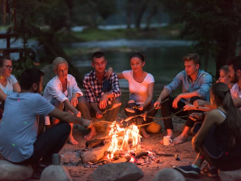 A Campfire with people sitting around it